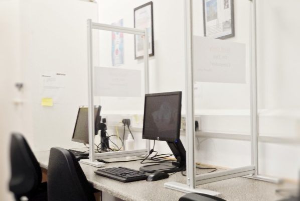 Close-up of computers in The Finglas Centre computer room