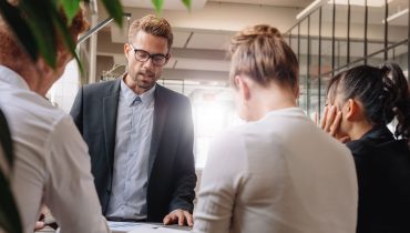 Businessman presenting a new business strategy to colleagues