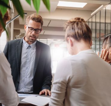 Businessman presenting a new business strategy to colleagues